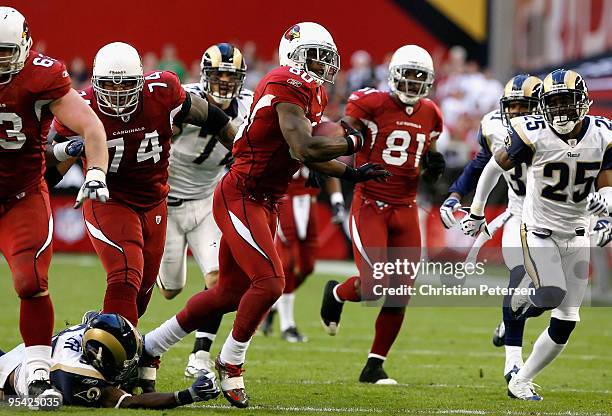 Wide receiver Early Doucet of the Arizona Cardinals rushes the football against the St. Louis Rams during the NFL game at the Universtity of Phoenix...