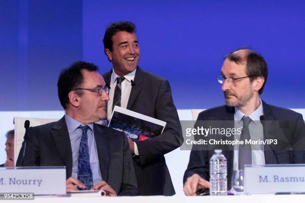 Arnaud Lagardere , the head of French media group Lagardere, arrives to attend the group's shareholders meeting, flanked by Chairman and Chief...