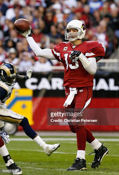 Quarterback Kurt Warner of the Arizona Cardinals throws a pass during the NFL game against the St. Louis Rams at the Universtity of Phoenix Stadium...
