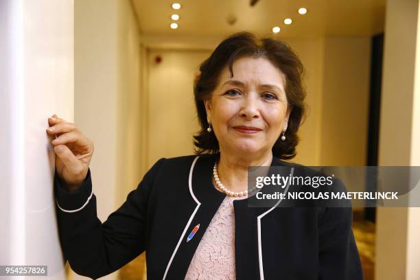 Tunesian journalist and human rights activist Sihem Bensedrine poses for the photographer ahead of a ceremony for the joint 'Doctor Honoris Causa'...