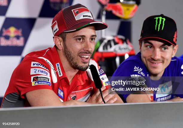 Ducati Team's Italian rider Andrea Dovizioso and Movistar Yamaha MotoGP's Spanish rider Maverick Vinales attend a press conference during the Red...