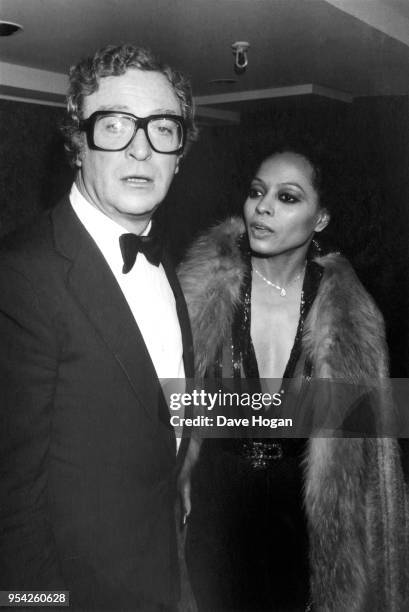 Actor Michael Caine and singer Diana Ross at an award ceremony circa 1984.