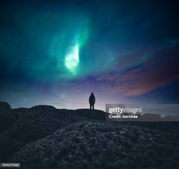 under the northern lights - aurora borealis stock pictures, royalty-free photos & images