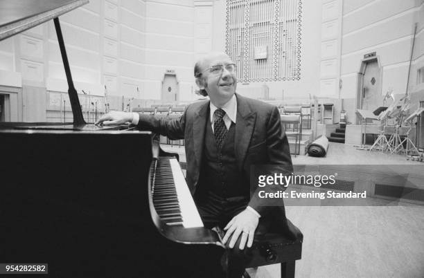 Soviet and Russian conductor Gennady Rozhdestvensky sitting at a piano, UK, 1st November 1977.