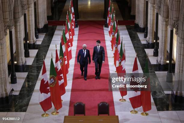 Justin Trudeau, Canada's prime minister, right, and Antonio Costa, Portugal's prime minister, walk down the Hall of Honour on Parliament Hill in...