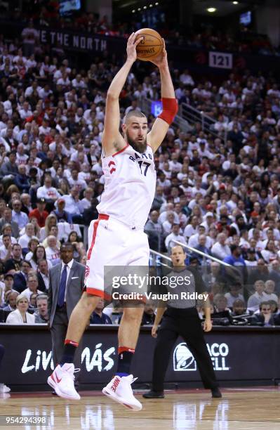 Jonas Valanciunas of the Toronto Raptors catches a pass in the first half of Game One of the Eastern Conference Semifinals against the Cleveland...