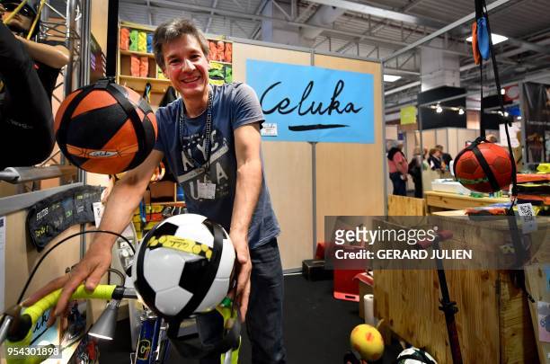 Jean-Baptiste Cortet presents his invention, "Le porte ballon Celuka" , a system to transport a ball on foot, or by bicycle during the 2018 Concours...