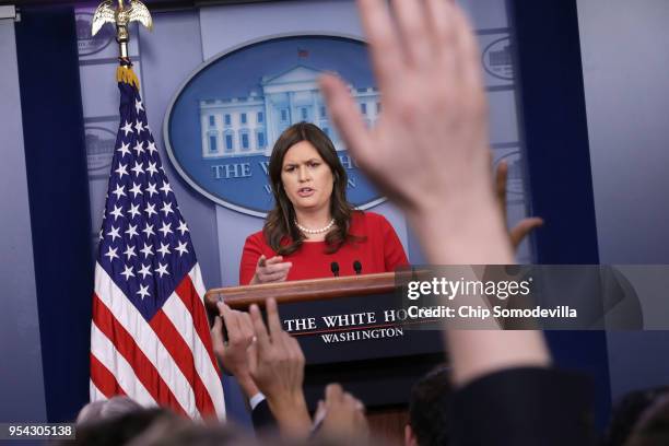 White House Press Secretary Sarah Huckabee Sanders calls on reporters during a news conference in the Brady Press Briefing Room at the White House...