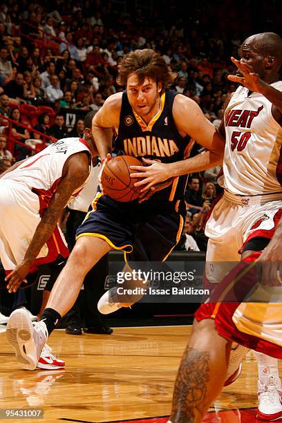 Josh McRoberts of the Indiana Pacers drives against the Miami Heat on December 27, 2009 at American Airlines Arena in Miami, Florida. NOTE TO USER:...