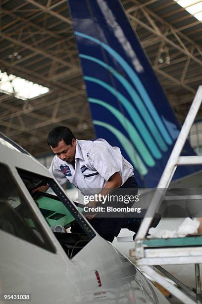 Garuda Indonesia airplane undergoes maintenance work in the Garuda Maintenance Facility at Soekarno-Hatta International Airport in Cengkareng,...