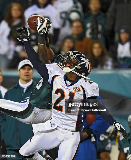 Cornerback Andre' Goodman of the Denver Broncos breaks up a pass intended for wide receiver Jeremy Maclin of the Philadelphia Eagles during the game...