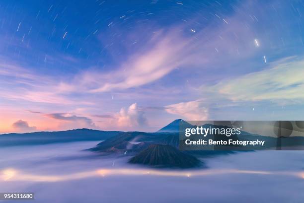 star trail over mt. bromo, java, indonesia - mt semeru stock-fotos und bilder