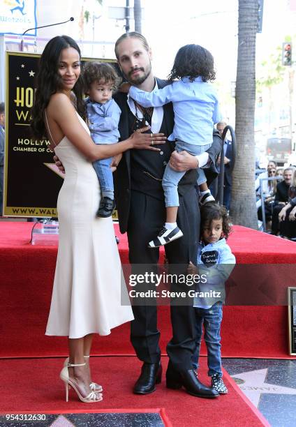 Zoe Saldana with Marco Perego and their children Bowie, Cy and Zen attend Zoe Saldana's star on the Hollywood Walk of Fame celebration ceremony on...