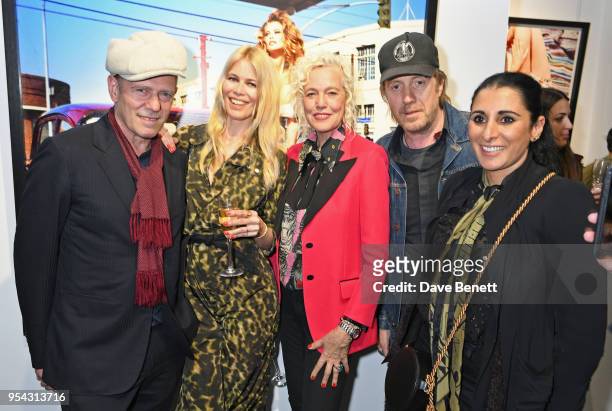 Paul Simonon, Claudia Schiffer, Ellen von Unwerth, Rhys Ifans and Serena Rees attend a private view of photographer Ellen von Unwerth's exhibition...