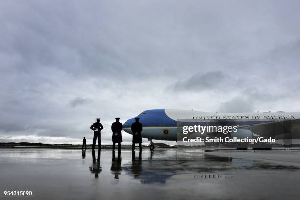 The official greeting party stands by just outside of the 89th Airlift Wing Passenger Terminal as President of the United States Donald J Trump...