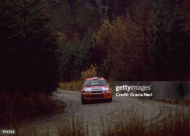 Tommi Makinen of Finland driving the Mitsubishi Lancer Evo VI during the FIA World Rally Championship around Cardiff, Wales. \ Mandatory Credit:...