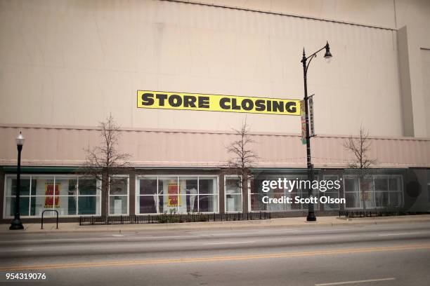 Signs advertise the closing of a Sears store on May 3, 2018 in Chicago, Illinois. The store, which opened in 1938, is the city's last remaining Sears...