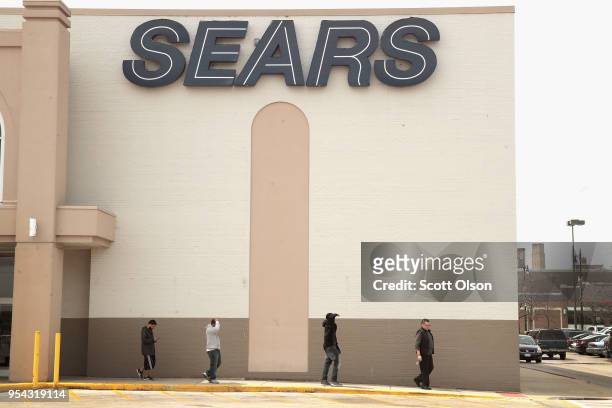 Customers shop at Chicago's last remaining Sears store on May 3, 2018 in Chicago, Illinois. The store, which opened in 1938, is scheduled to close in...