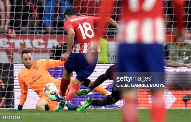 Atletico Madrid's Spanish forward Diego Costa scores a goal during the UEFA Europa League semi-final second leg football match between Club Atletico...