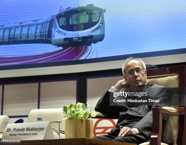 Former President Pranab Mukherjee looks on during the 24th Foundation Day celebration of Delhi Metro, at Metro Bhawan, on May 3, 2018 in New Delhi,...