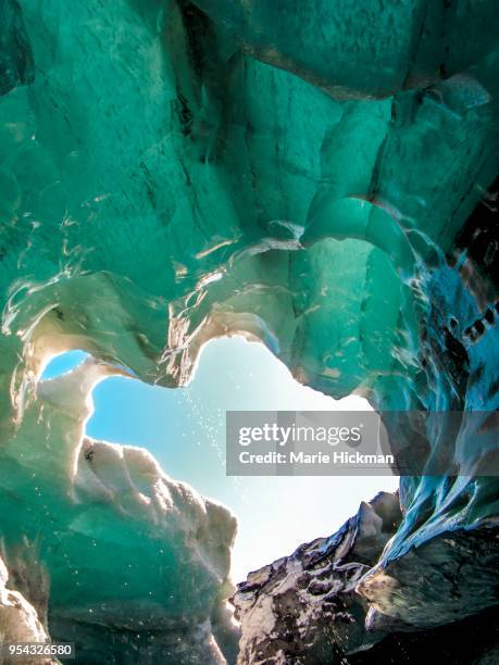 droplets of water coming off a rapidly melting glacier due to global warming. - marie hickman stock pictures, royalty-free photos & images