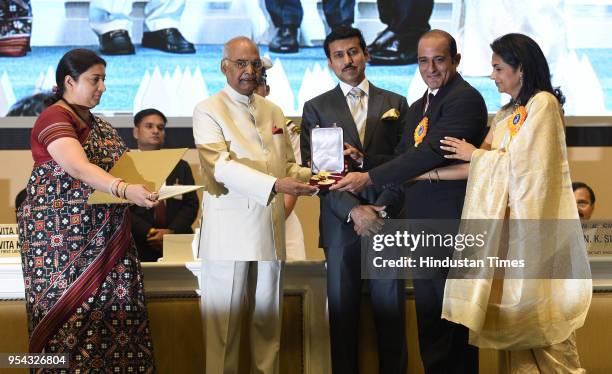 Kavita Khanna and Akshay Khanna on behalf of Late Vinod Khanna recieve the Dada Saheb Phalke Award, awarded posthumously, as Member of Parliament...