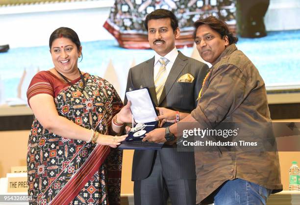 Smriti Zubin Irani along with Rajyavardhan Singh Rathore presents National Awards for Best Choreography to Ganesh Acharya for the Hindi movie -...