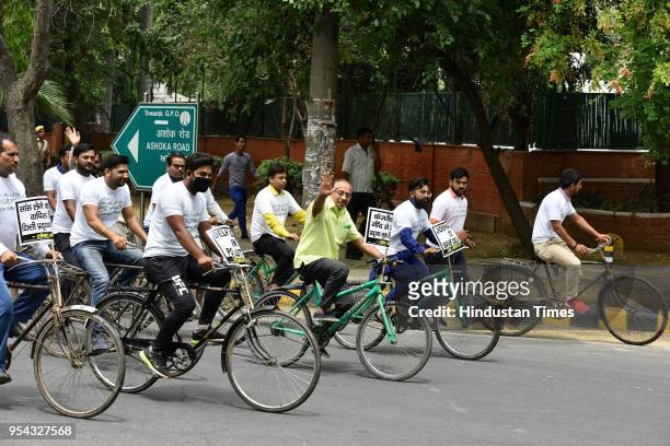 Former Delhi BJP President and Union Minister Vijay Goel leads an anti-pollution cycle rally from Ashoka Road to Patel Chowk and back to his...