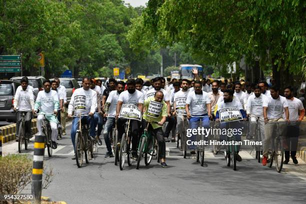 Former Delhi BJP President and Union Minister Vijay Goel leads an anti-pollution cycle rally from Ashoka Road to Patel Chowk and back to his...