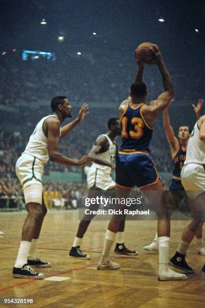 Bill Russell of the Boston Celtics defends Wilt Chamberlain of the San Francisco Warriors circa 1964 at the Boston Garden in Boston, Massachusetts....