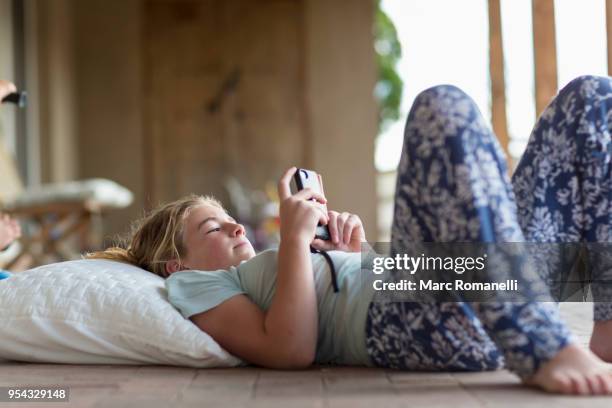 12 year old girl listening to music - lamy new mexico stock pictures, royalty-free photos & images