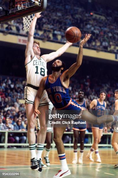 Walt Frazier of the New York Knicks goes to the basket against the Boston Celtics circa 1972 at the Boston Garden in Boston, Massachusetts. NOTE TO...