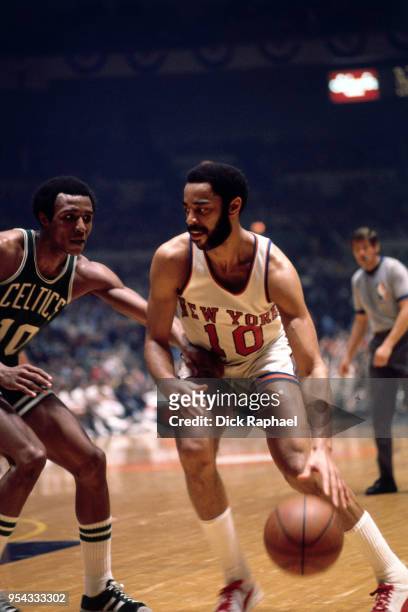 Walt Frazier of the New York Knicks handles the ball against the Boston Celtics circa 1972 at Madison Square Garden in New York City, New York. NOTE...