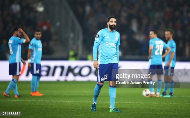 Adil Rami of Marseille looks dejected during the UEFA Europa Semi Final Second leg match between FC Red Bull Salzburg and Olympique de Marseille at...