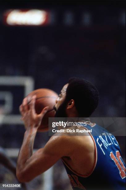 Walt Frazier of the New York Knicks handles the ball against the Boston Celtics circa 1972 at the Boston Garden in Boston, Massachusetts. NOTE TO...