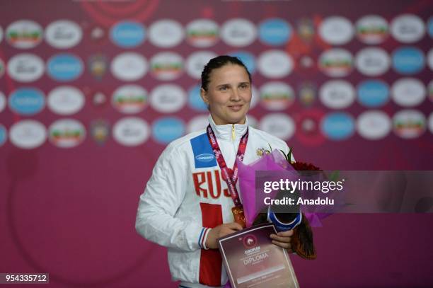 Gold medalist Anastasia Bratchikova of Russia on the stage after competing in the women's 68 kg category within the 2018 European Wrestling...