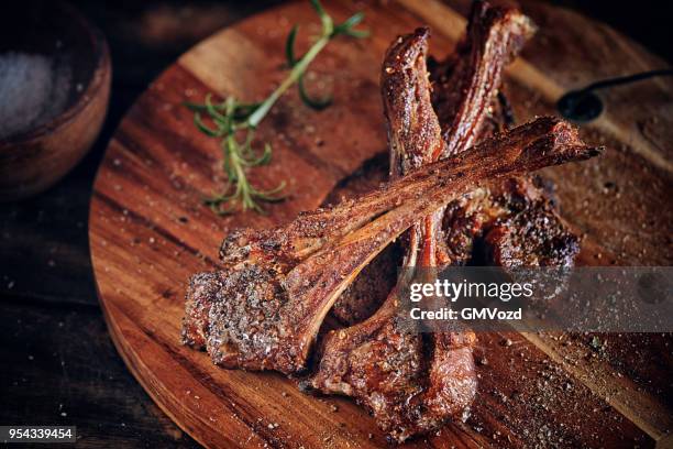 roasted lamb chops with lemon - cutlet stock pictures, royalty-free photos & images