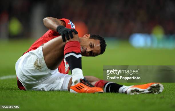 Nani of Manchester United on the ground after an injury during the Barclays Premier League match between Manchester United and Aston Villa at Old...