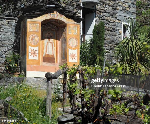 votive chapel among the vineyards in giumaglio, maggia valley, ticino - giumaglio stock pictures, royalty-free photos & images