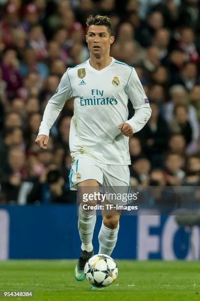 Cristiano Ronaldo of Real Madrid controls the ball during the UEFA Champions League Semi Final Second Leg match between Real Madrid and Bayern...