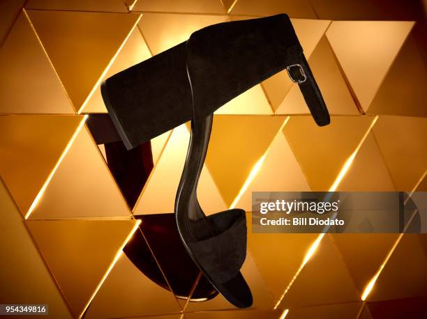 black high heel shoe - gold shoe stock pictures, royalty-free photos & images