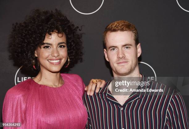 Actress Parisa Fitz-Henley and actor Murray Fraser arrive at Lifetime's afternoon tea in celebration of the premiere of "Harry And Meghan: A Royal...