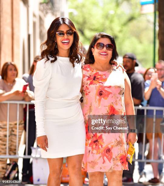 Priyanka Chopra and Madhu Chopra leave ABC's "The View" at ABC Studios on May 3, 2018 in New York City.