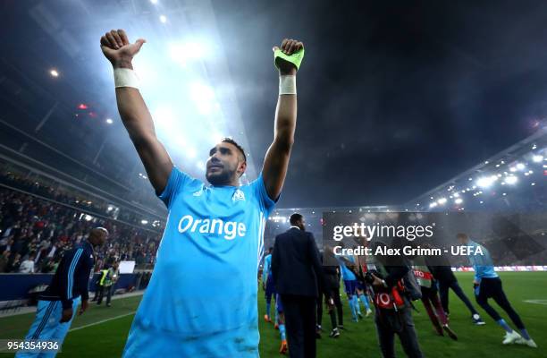 Dimitri Payet of Marseille celebrates to the fans after winning the UEFA Europa Semi Final Second leg match between FC Red Bull Salzburg and...