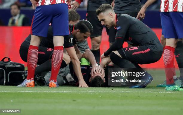 Laurent Koscielny of Arsenal is seen after he was injured during the UEFA Europa League semi final return match between Atletico Madrid and Arsenal...