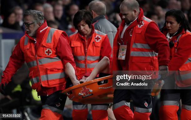 Laurent Koscielny of Arsenal is seen after he was injured during the UEFA Europa League semi final return match between Atletico Madrid and Arsenal...