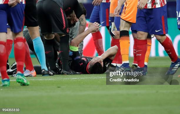 Laurent Koscielny of Arsenal is seen after he was injured during the UEFA Europa League semi final return match between Atletico Madrid and Arsenal...