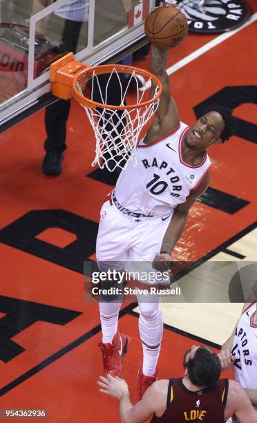 Toronto Raptors guard DeMar DeRozan dunks as the Toronto Raptors play the Cleveland Cavaliers in the second round of the NBA playoffs at the Air...