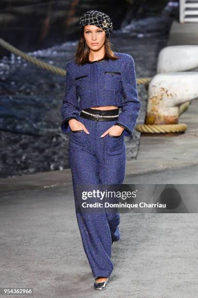 Bella Hadid walks the runway during the Chanel Cruise 2018/2019 Collection at Le Grand Palais on May 3, 2018 in Paris, France.