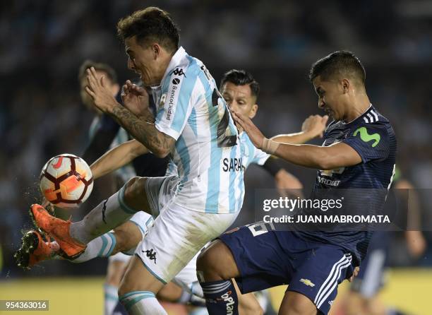 Chile's Universidad de Chile forward Nicolas Guerra vies for the ball with Argentina's Racing Club defender Renzo Saravia during their Copa...